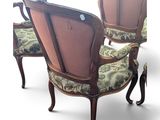 pair of antique chairs with upholstered upholstered cushions