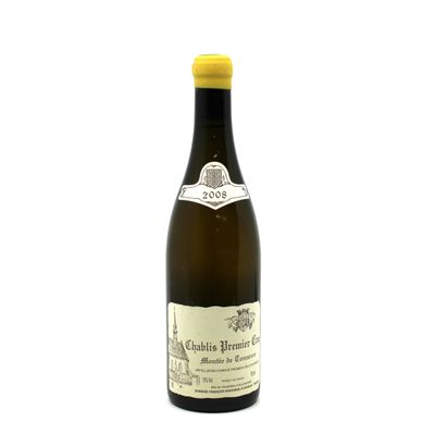 a bottle of wine that is sitting on a table