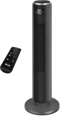 an image of a black tower fan next to a remote control