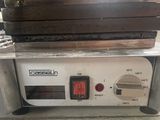 an image of a close up of a toaster on a counter