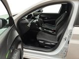 the interior of a car with the door open and the driver ' s seat up