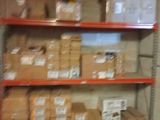 shelves with boxes and boxes on them in a warehouse