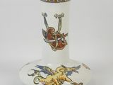a white vase with a picture of a horse on it