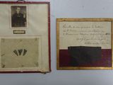 three framed pictures on the wall of a room