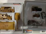 a box with a set of toy vehicles inside of it