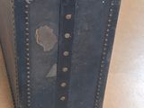 an old suitcase sitting on the floor on the floor
