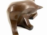 statue of a brown bear on a white background