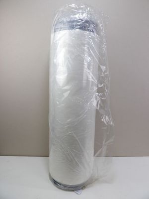 a roll of toilet paper wrapped in plastic on a table