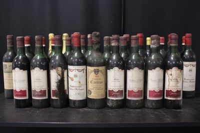 several bottles of wine are lined up on a table
