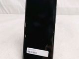 an image of a close up of a cell phone on a table