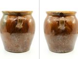 two pictures of a brown vase on a white background