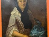 portrait of a woman in a brown dress with a black shawl and a blue hat