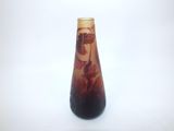 a vase that is sitting on a white surface