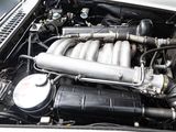 a close up of a car ' s engine with its hood open