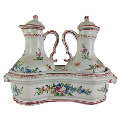 two vases that have been decorated with flowers on them