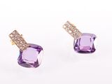 a pair of amethorate and diamond earrings