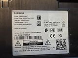 a close up of a label on the back of a laptop
