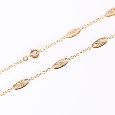 Chaîne en or (750‰), maille ronde intercalée de motifs filig… - Photo 1