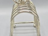 silver plated ring holder with four rings on each side