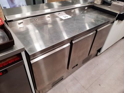 a stainless steel counter in a kitchen with a lot of counter space