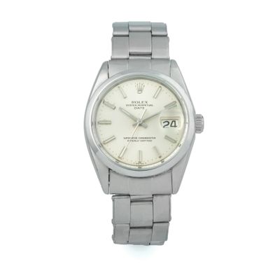 an image of a silver watch with roman numerals on a bracelet