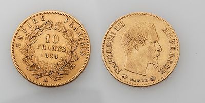 a gold coin with a woman ' s face and laurels on it
