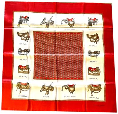 red and white square scarf with horses and saddles on it