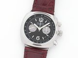 an image of a wrist watch with a black dial and red leather strap