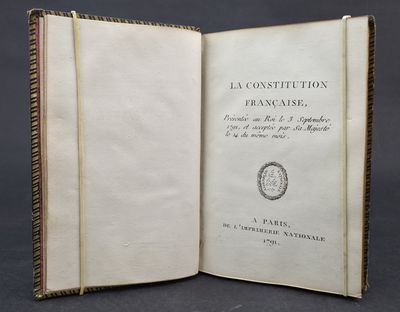 an open book with a picture of a seal on it