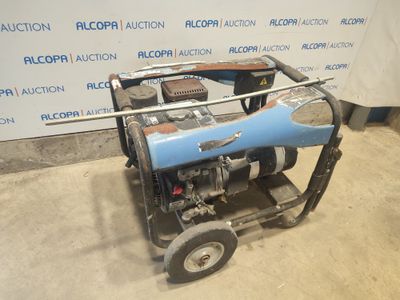 a small blue machine that is sitting on the ground