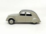 a toy car that is sitting on a white surface