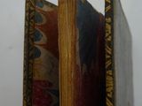 a close up of a book opened to show the inside of it