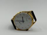 a close up of a wrist watch with a white face