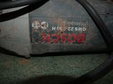 a picture of a close up of a motor on the ground