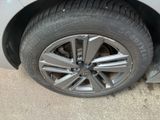 a close up of a tire on a car ' s rim