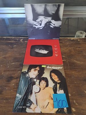 the doors are open on a wooden table with a picture of the doors