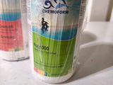 two bottles of chemoform are wrapped in plastic on a table