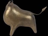 an image of a gold bull statue on a black background