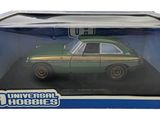 the box is open to show the green car in it ' s packaging
