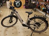 a bike that is parked in a store with other bikes