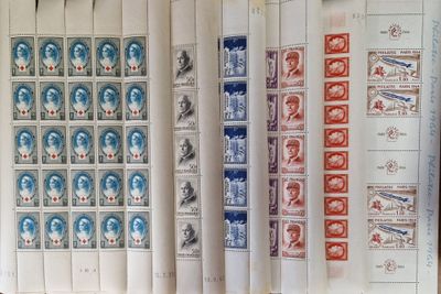 a lot of stamps that are on the wall