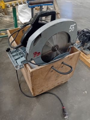 a picture of a circular saw in a wooden box