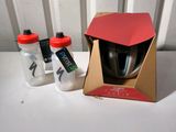 two bottles of water and a bottle of water in a cardboard box