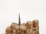 wooden model of a cathedral with a steeple and a steeple on the roof