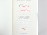 an open book that has a picture of a cat on it
