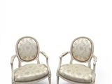 a pair of antique chairs with upholstered upholstered arms