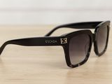 the sunglasses are on the table and ready to be worn