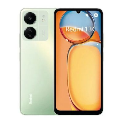 un gros plan d'un téléphone vert et blanc pris avec l'appareil photo d'un Redmi 3C