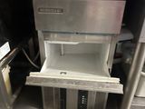 an image of a refrigerator and freezer in a kitchen