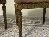 two stools that are sitting next to each other on the floor